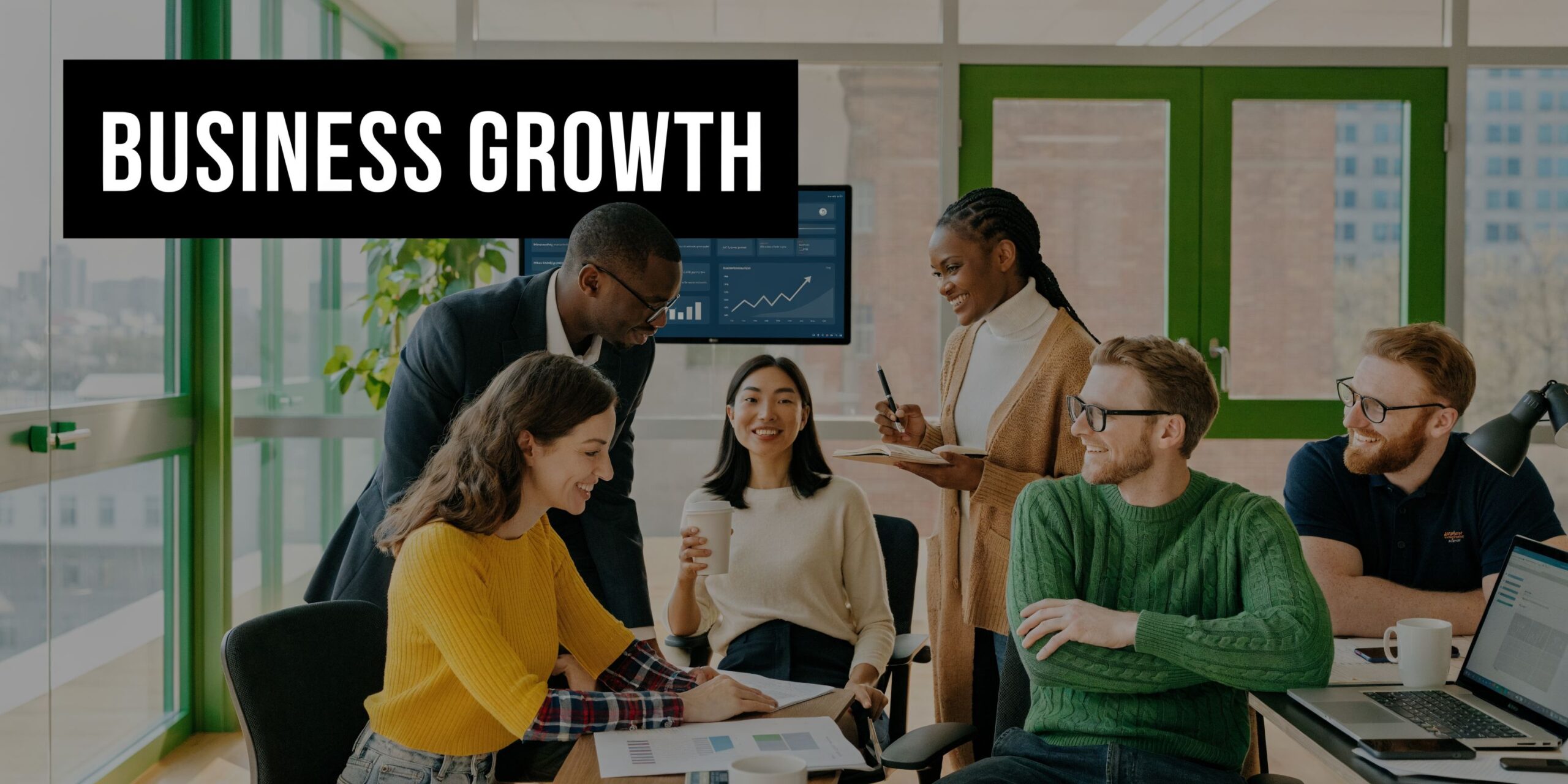 A diverse team of professionals collaboratively discussing business growth and performance data in a modern office setting.